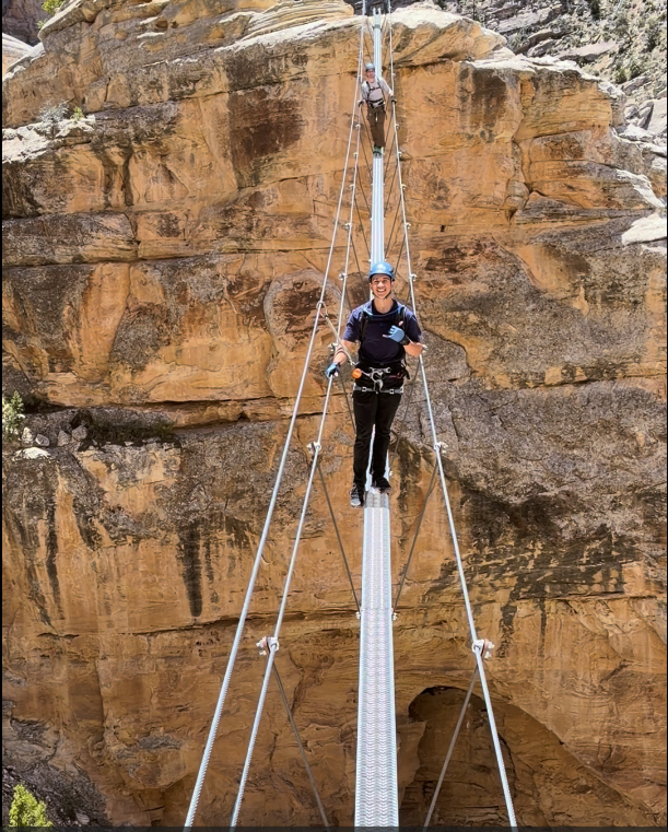 Shaun on the suspension bridge at Ashley Gorge Via Ferrata